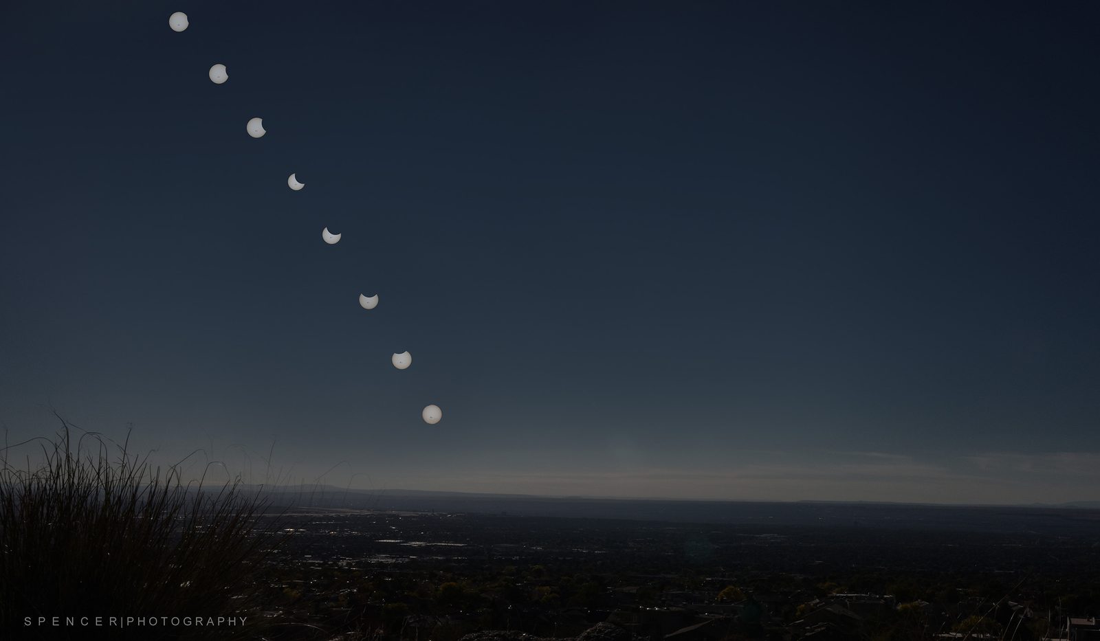 Partial Eclipse Stack of the Moon Moving in Front of the Sun.