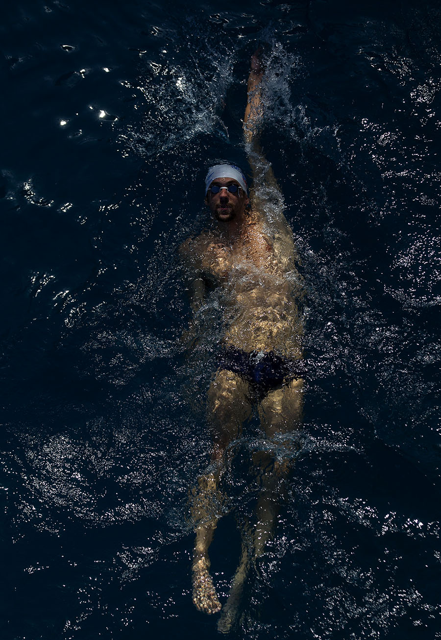 SANTA CLARA, CA - JUNE 17: Michael Phelps warms up in the practice pool during day 2 of the Santa Clara International Grand Prix at George F. Haines International Swim Center on June 17, 2011 in Santa Clara, California. (Photo by Jed Jacobsohn)