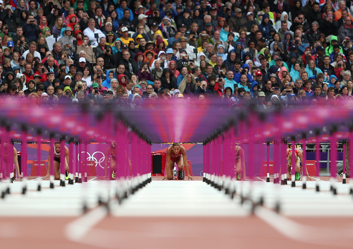 Lolo Jones prepares to run in the 100m hurdles during track and field at the Olympic Stadium during day 11 of the London Olympic Games in London, England, United Kingdom on August 7, 2012. (Jed Jacobsohn/for The New York Times)